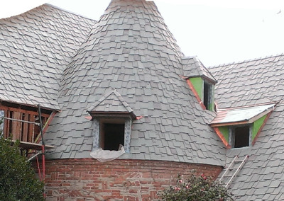 Former cedar shake roof replaced with Greenstone genuine slate