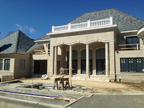 Who’s building the mansion along Turkeyfoot Road?