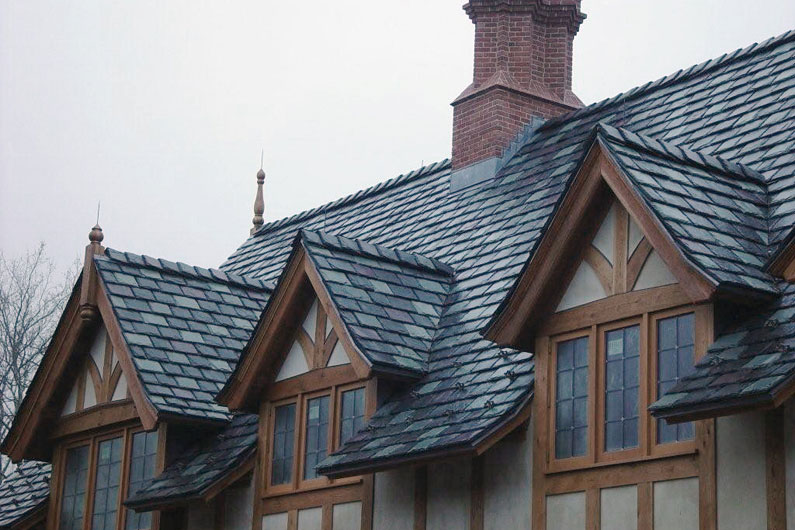Gray, Green, and Purple Slate Blend on Tudor Style Home