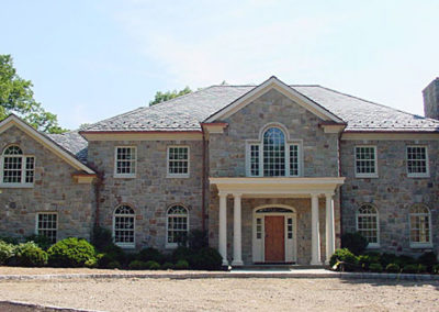 Slate and Stone Colonial Style home
