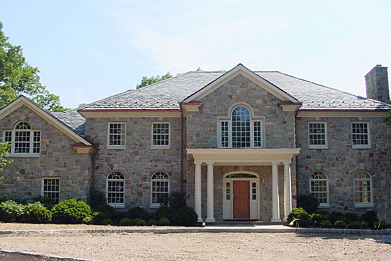 Slate and Stone Colonial Style home