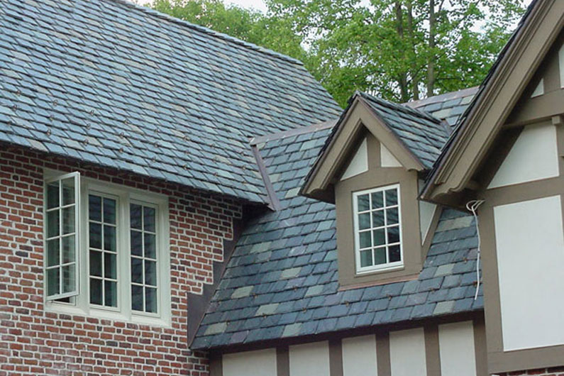 Tudor-Style Condominium with Purple and Green Slate Blend