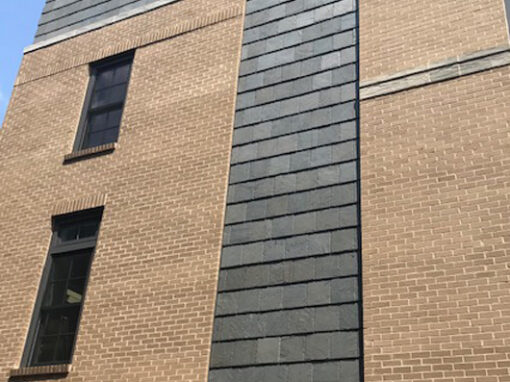 Slate cladding for luxury condominium complex: Greenstone Slate® Vermont Clear Gray installed using the Nu-lok™ slate installation system
